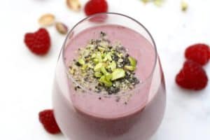 Berry Smoothie with banana, strawberries, raspberries, almond milk, hemp seeds, chia seeds,